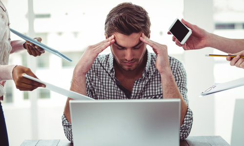 Man stressed out at work